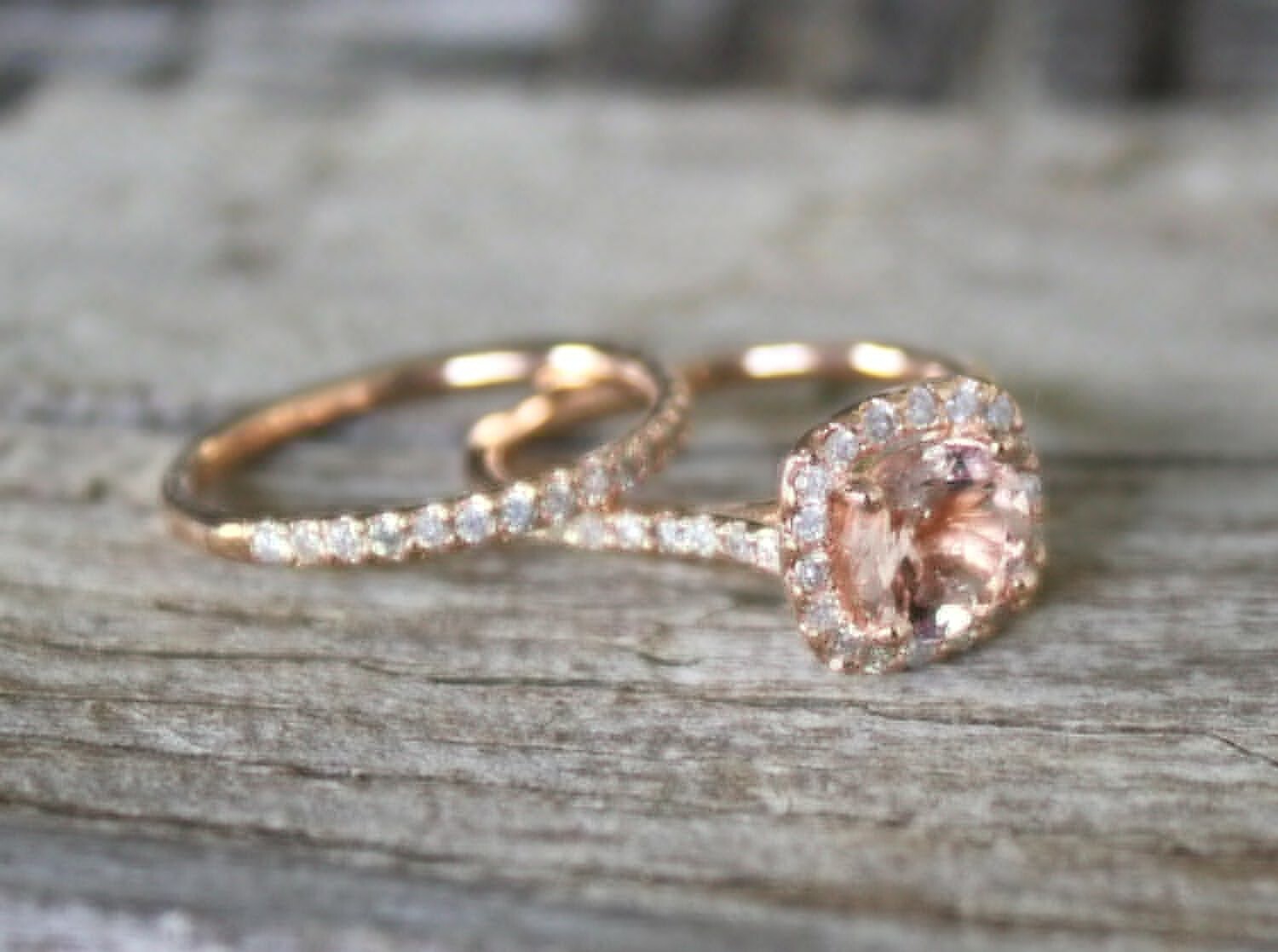 gold engagement rings on finger