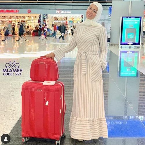 traveler hijabi in a dress