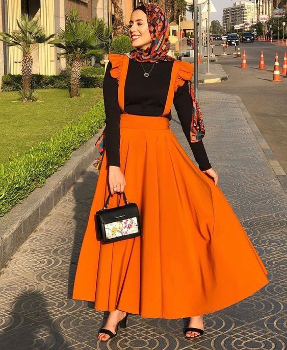 تنسيق الفساتين من غير اكمام للمحجبات 19