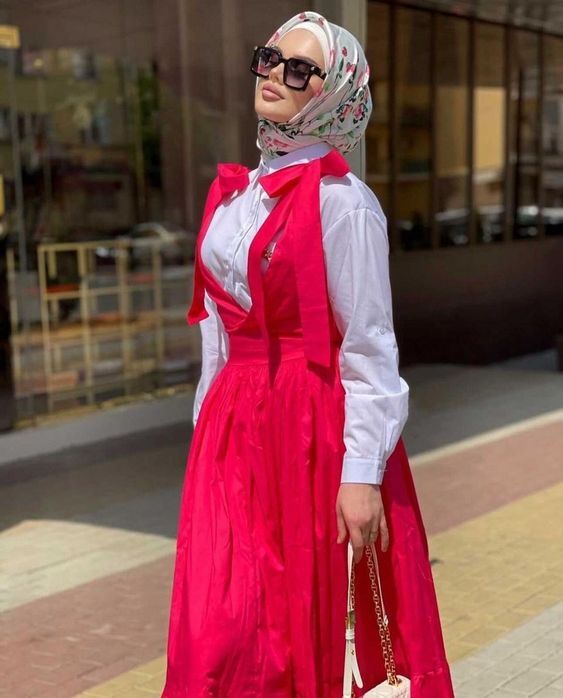 تنسيق الفساتين من غير اكمام للمحجبات 20