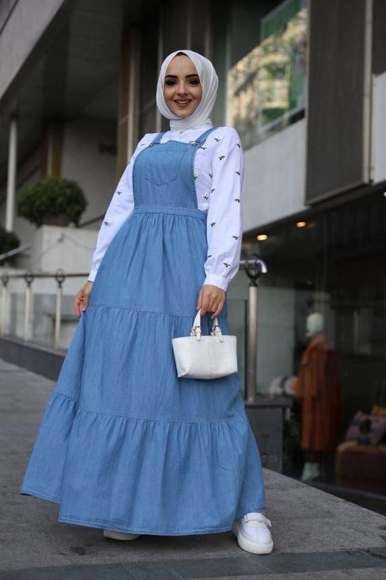 تنسيق الفساتين من غير اكمام للمحجبات 26