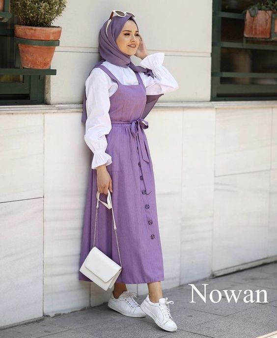 تنسيق الفساتين من غير اكمام للمحجبات 39